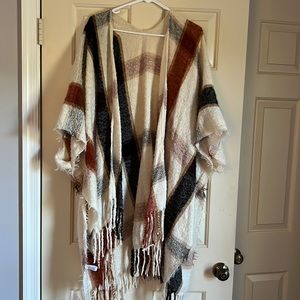 Warm fall colored fringe bottom shawl. One size